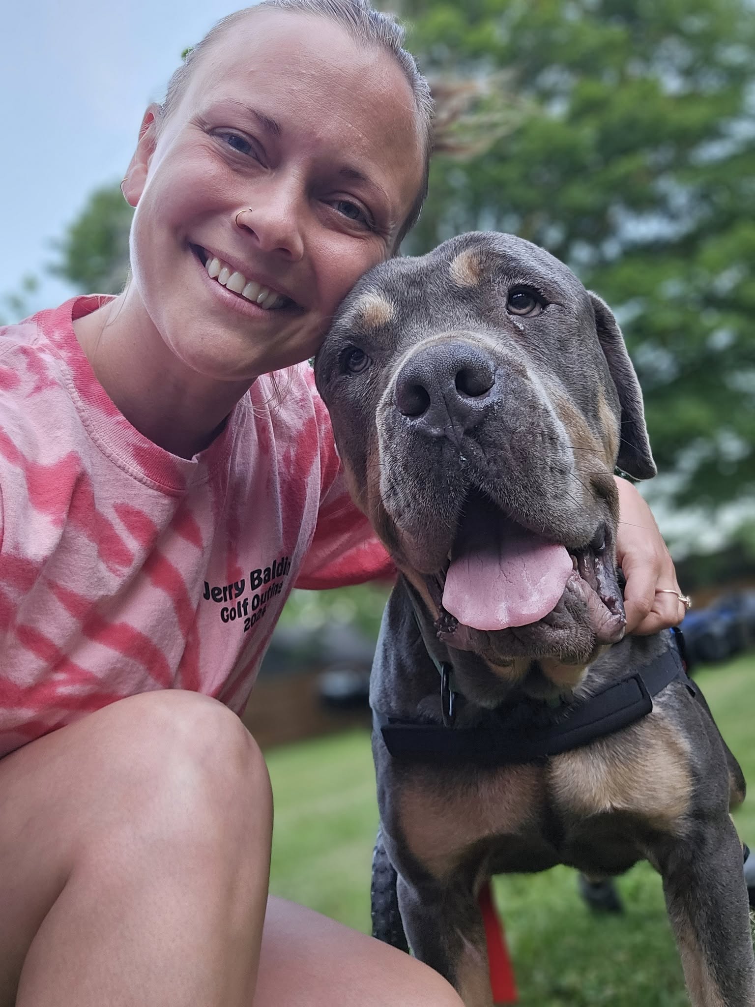 Natalie, Executive Director of Cass County Humane Society, with one of our shelter dogs